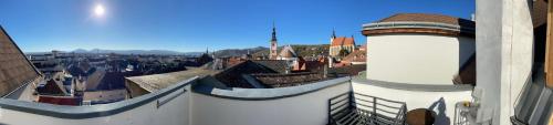 a view of a city from the top of a building at Terrassen Appartement über den Dächern von Krems in Krems an der Donau