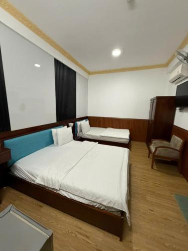 Katil atau katil-katil dalam bilik di Tâm Tín Hotel Hồ Chí Minh