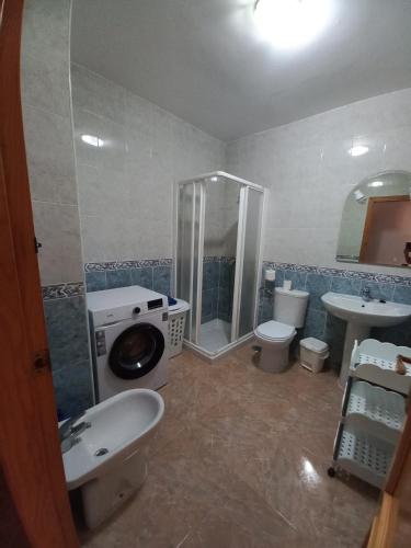 a bathroom with a shower and a sink and a toilet at Apartamento Villaricos con parking in Villaricos