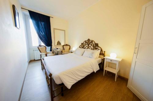 Postel nebo postele na pokoji v ubytování Azzurra Home