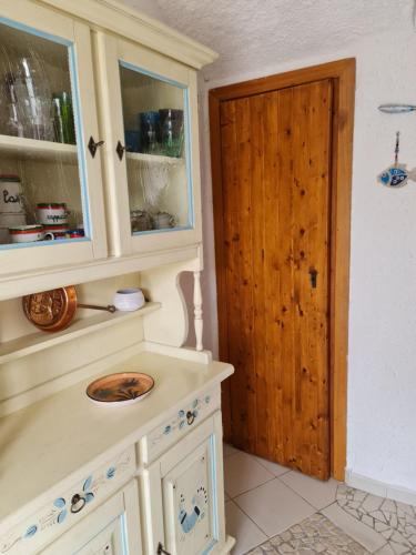 Nhà bếp/bếp nhỏ tại Villetta Baia Reparata