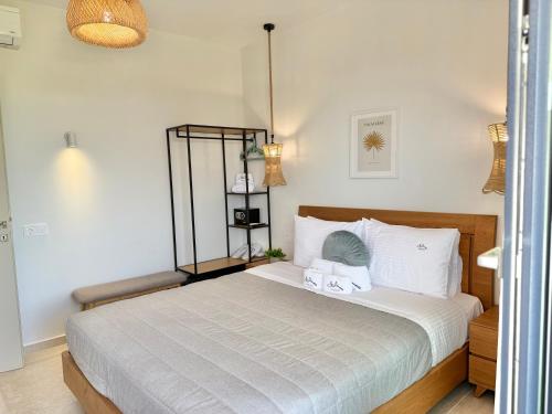 Postel nebo postele na pokoji v ubytování Malka Premium Suites