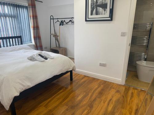 Postel nebo postele na pokoji v ubytování Tarleton Guesthouse