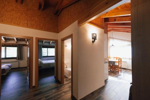 Postel nebo postele na pokoji v ubytování Apartaments i Bungalows Càmping L'Orri del Pallars