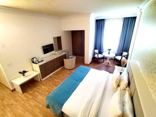 Hotel Méditerranée Beyrouthにあるベッド