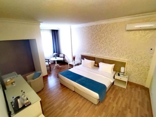 Hotel Méditerranée Beyrouthにあるベッド