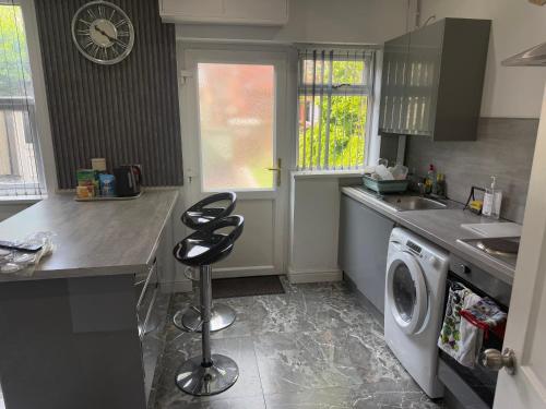 Kuchyň nebo kuchyňský kout v ubytování Tarleton Guesthouse