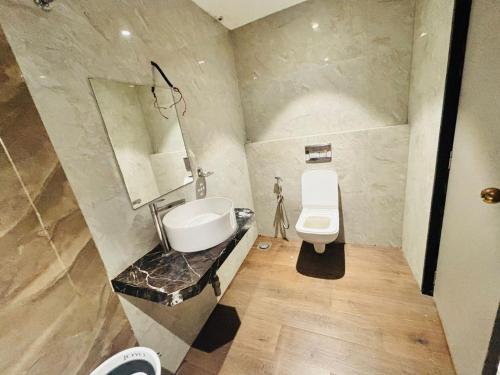 Koupelna v ubytování Hotel Dolphin Residency