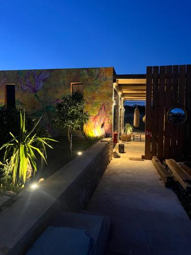 a mural on the side of a building with lights at Romantic Best View - Saïss Bay Estate - Coco Green in Sidi Kaouki