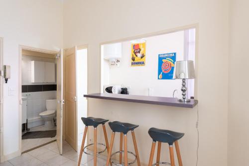 LE RÉTRO studio avec mezzanine en plein centre