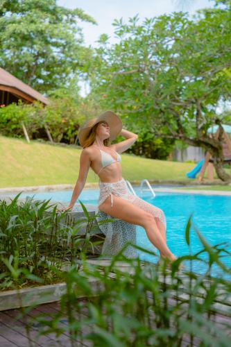 Kolam renang di atau dekat dengan Tijili Hotel Benoa