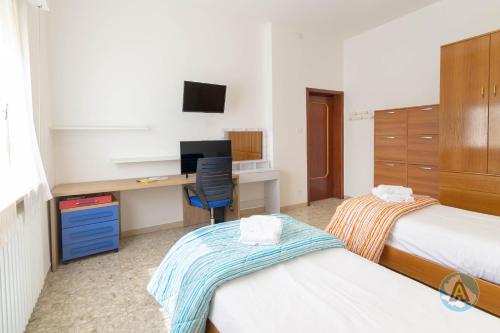 Postel nebo postele na pokoji v ubytování 79a - comodo appartamento per il mare