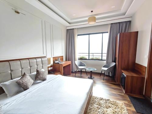 Katil atau katil-katil dalam bilik di The Palm Aryan Gangtok 12 mins MG Marg