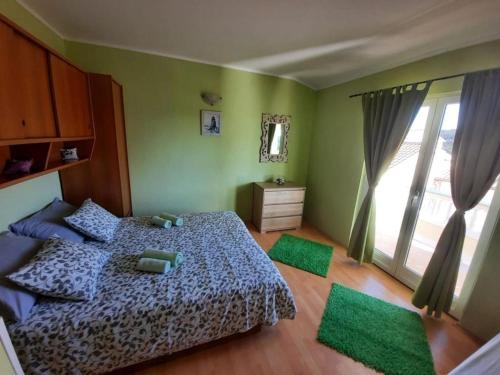 Posteľ alebo postele v izbe v ubytovaní Apartments Kampor (4235)