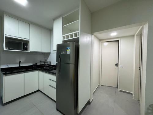 Een keuken of kitchenette bij Maragogi-Peroba Ville Residence03