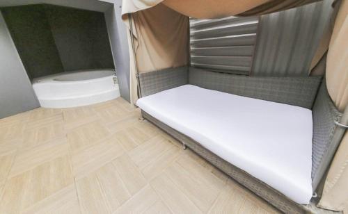 Cama o camas de una habitación en Ami Boutique Hotel, Yongin