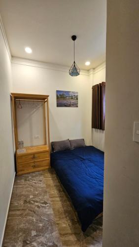 Postel nebo postele na pokoji v ubytování Colmar Dalat