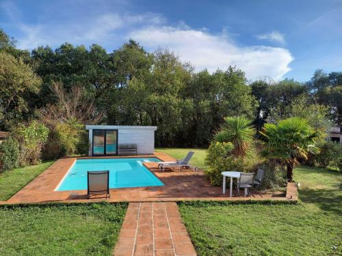 Villa de charme en bois avec Piscine privée calme et proche de Toulouse