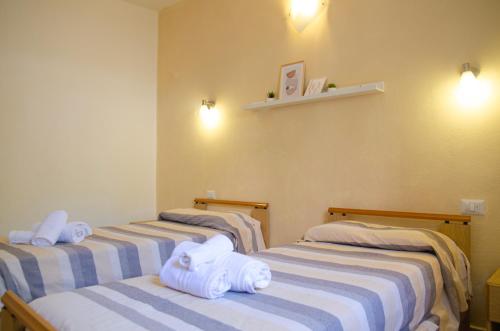 Φωτογραφία από το άλμπουμ του 5min Spiaggia Budoni - APT con Ampia Veranda Relax σε Brunella