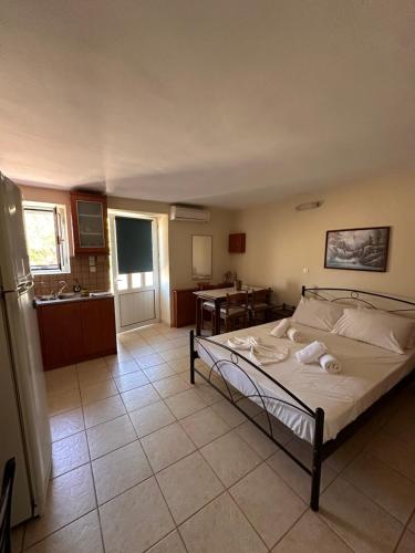 A bed or beds in a room at Studio Lakis Barbajonn's Stone House