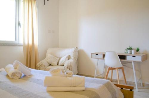 Φωτογραφία από το άλμπουμ του 5min Spiaggia Budoni - APT con Ampia Veranda Relax σε Brunella