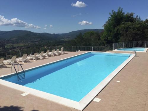 The swimming pool at or close to Lovely Apartment in Citerna with Swimming Pool