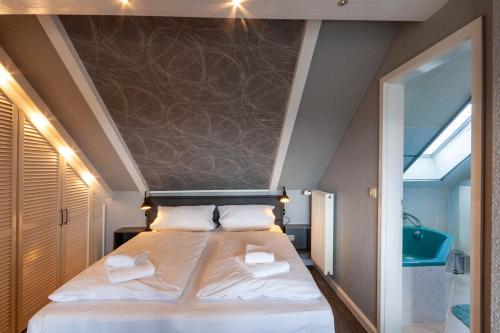 Katil atau katil-katil dalam bilik di Ferienwohnung Kühl 3 mit Balkon, Sauna und Fitnessraum