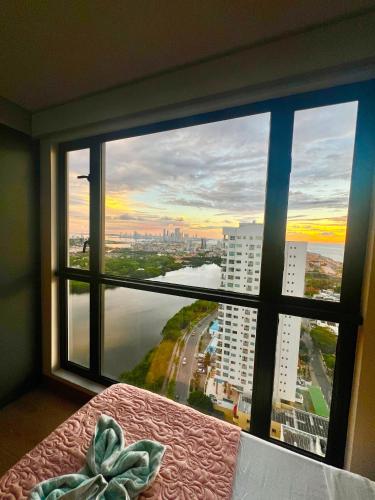 Postel nebo postele na pokoji v ubytování Murano centro 1 - 25 Floor byIMZ