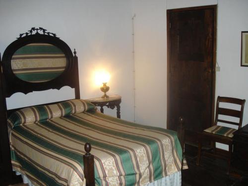 Ένα ή περισσότερα κρεβάτια σε δωμάτιο στο Quinta Santa Isabel
