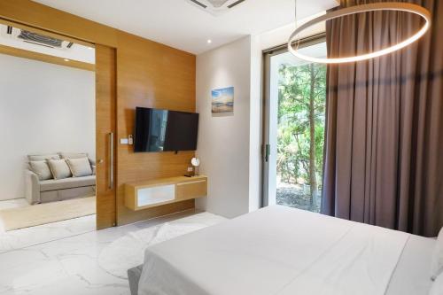 Postel nebo postele na pokoji v ubytování Luxury Villa Residence near Laguna