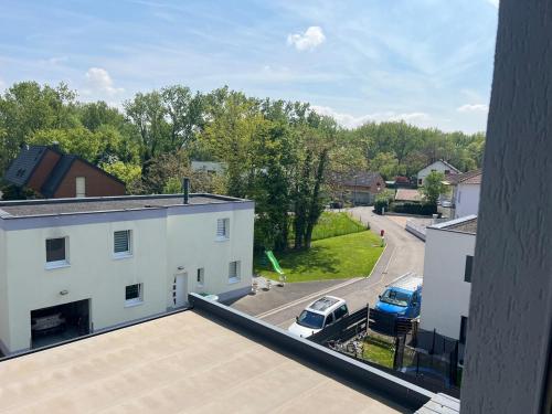 an aerial view of a building and a parking lot at TheBeautifulView in Saint-Louis