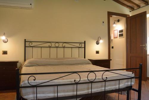 Giường trong phòng chung tại Agriturismo Dei Setteventi