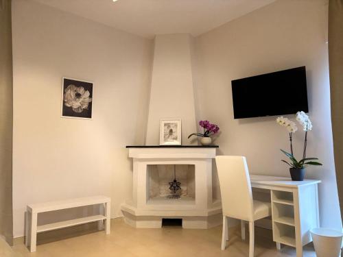TV a/nebo společenská místnost v ubytování Maison Marienne