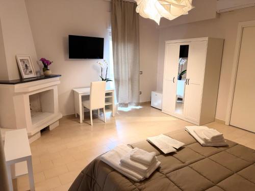 TV a/nebo společenská místnost v ubytování Maison Marienne