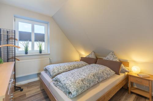 Katil atau katil-katil dalam bilik di Ferienwohnung Fria