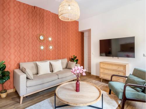 Televízia a/alebo spoločenská miestnosť v ubytovaní Cozy Apartment - Opera - Caumartin I