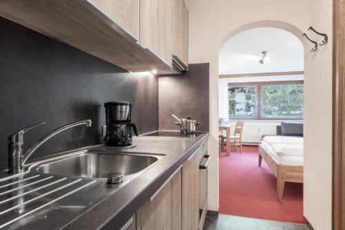 Kuchyň nebo kuchyňský kout v ubytování Haus Gariella