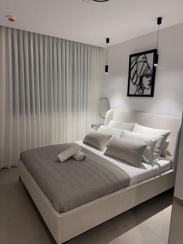 Ένα ή περισσότερα κρεβάτια σε δωμάτιο στο bnb360 - 70
