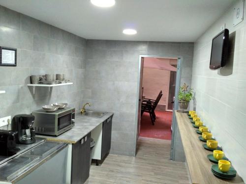Dapur atau dapur kecil di Guesthouse Central