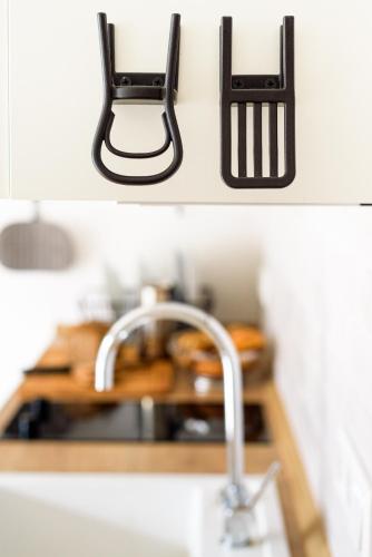 a kitchen with a sink and a faucet at Zweitraum in Oldenburg in Oldenburg