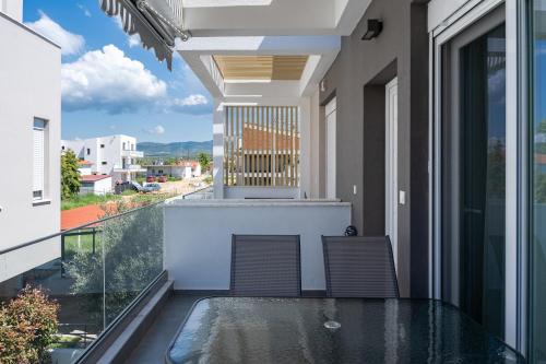 Balkón nebo terasa v ubytování Danai & Palm Residential Complexes