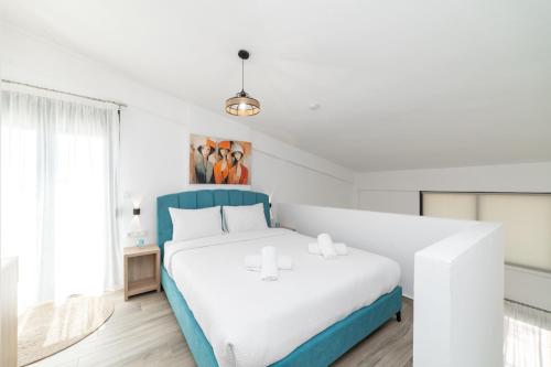 Postel nebo postele na pokoji v ubytování Danai & Palm Residential Complexes