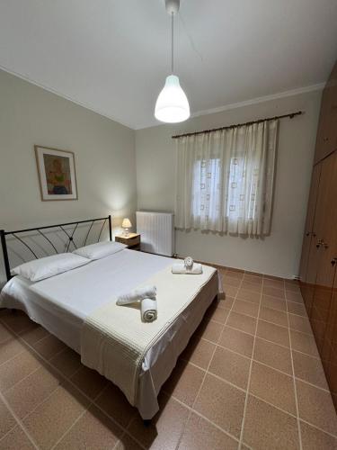 Ένα ή περισσότερα κρεβάτια σε δωμάτιο στο Art House
