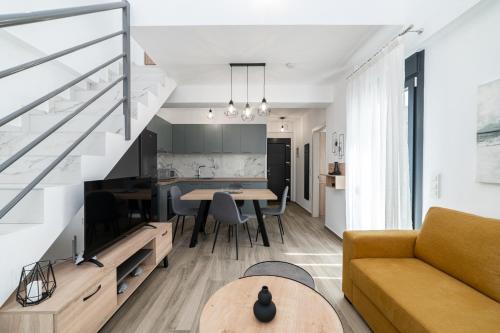 TV a/nebo společenská místnost v ubytování Danai & Palm Residential Complexes