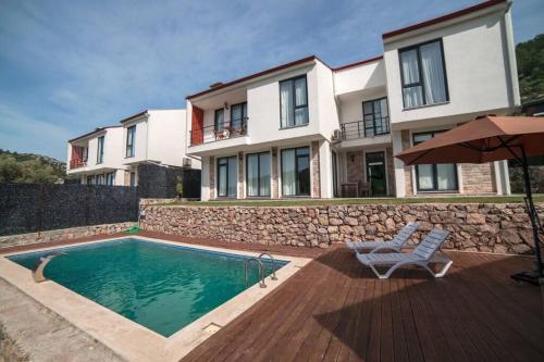 Πισίνα στο ή κοντά στο Villa Sakura