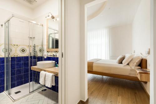 Koupelna v ubytování YourHome - Lidia Rooms & Suites