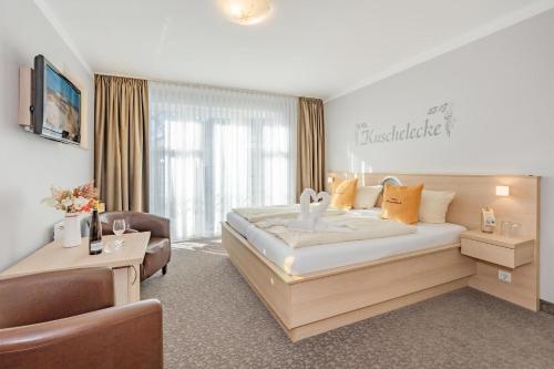 Postel nebo postele na pokoji v ubytování Aparthotel Strandhus