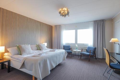 Postel nebo postele na pokoji v ubytování Hotell Veckefjärden