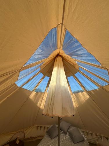 a large umbrella with a window in the middle at Luxury Glamping - Heydaze in Lostwithiel