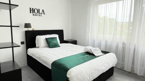 Ένα ή περισσότερα κρεβάτια σε δωμάτιο στο Hola Hotel Stuttgart